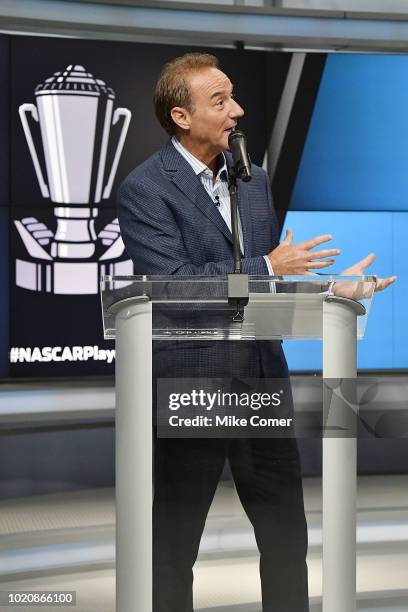 Vince Welch of Fox Sports addresses the drivers assembled for the NASCAR Camping World Truck Series press conference during the Production Media Day...