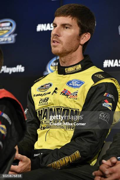 Grant Enfinger answers questions from the media assembled for the NASCAR Camping World Truck Series Production Media Day at FOX Sports Studios on...