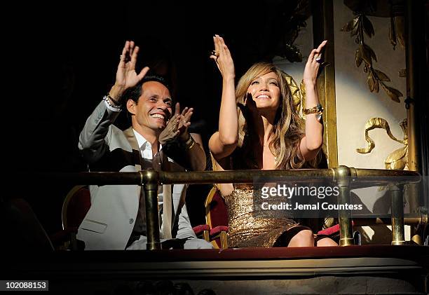 Singer Marc Anthony and singer\actress Jennifer Lopez wave to the crowd in the Apollo Theater during the 2010 Apollo Theater Spring Benefit Concert &...