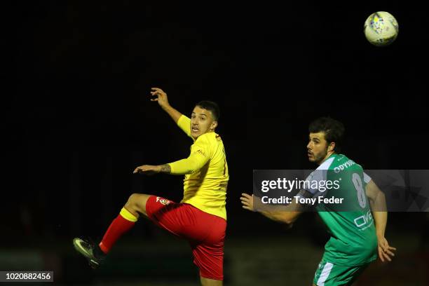 Dino Fajkovic of Broadmeadow contests the ball with Blake Thompson of Bentleigh during the FFA Cup round of 16 match between Broadmeadow Magic and...