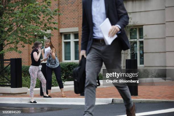 Members of the media stands outside of District Court in Alexandria, Virginia, U.S., on Tuesday, Aug. 21, 2018. A federal jury convicted Paul...