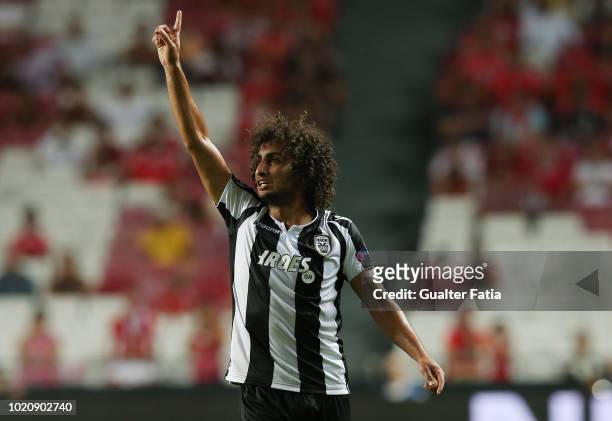 Amr Warda of PAOK celebrates after scoring a goal during the UEFA Champions League Play Off match between SL Benfica and PAOK at Estadio da Luz on...