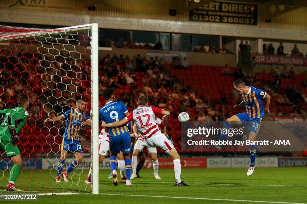 James Bolton of Shrewsbury Town misses a free header on goal during the Sky Bet League One match between Doncaster Rovers and Shrewsbury Town at...