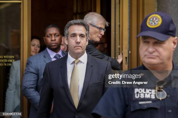 Michael Cohen, President Donald Trump's former personal attorney and fixer, exits federal court, August 21, 2018 in New York City. Cohen reached an...