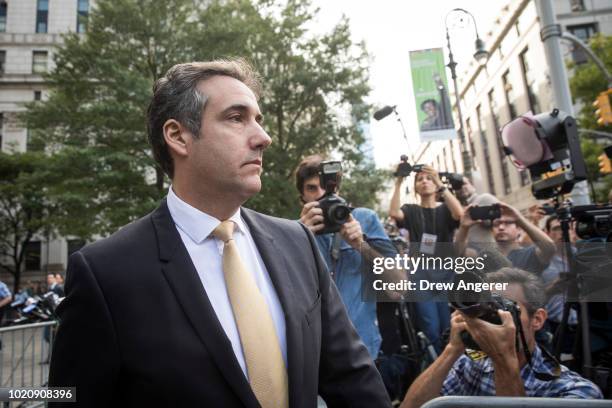 Michael Cohen, President Donald Trump's former personal attorney and fixer, exits federal court, August 21, 2018 in New York City. Cohen reached an...