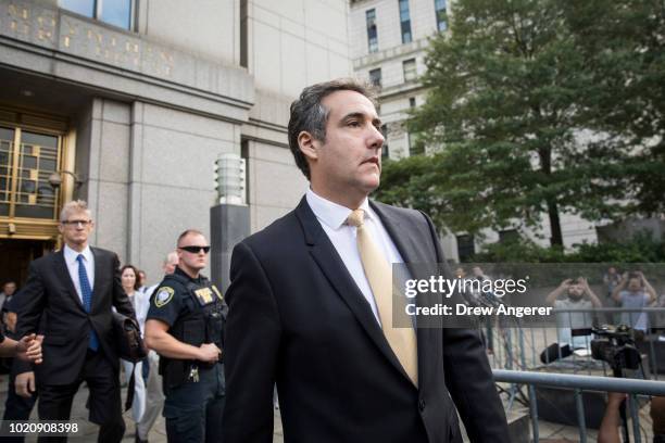 Michael Cohen, President Donald Trump's former personal attorney and fixer, exits federal court, August 21, 2018 in New York City. Cohen reached an...