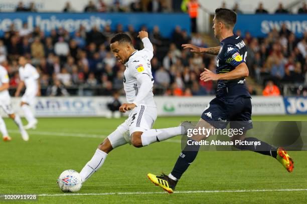 Martin Olsson of Swansea City takes a cross during the Sky Bet Championship match between Swansea City and Leeds United at the Liberty Stadium on...