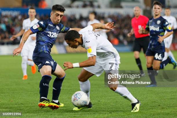 Jefferson Montero of Swansea City against Pablo Hernandez of Leeds United during the Sky Bet Championship match between Swansea City and Leeds United...