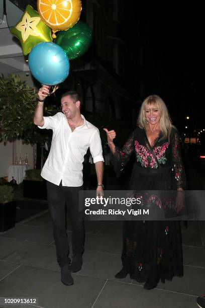 Tyrone Wood and Jo Wood seen on a night out at Scott's restaurant celebrating Tyrone's birthday on August 21, 2018 in London, England.