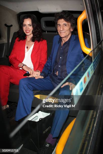 Ronnie Wood and Sally Humphreys seen on a night out at Scott's restaurant celebrating son Tyrone's birthday on August 21, 2018 in London, England.