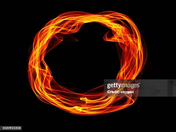 circle of fire isolated on black - gold light effect stock pictures, royalty-free photos & images