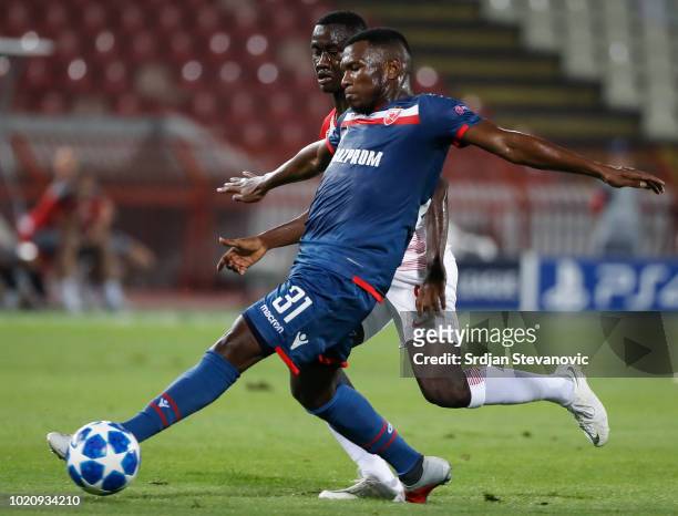 El Fardou Ben Nabouhane of Crvena Zvezda in action against Diadie Samassekou of Red Bull Salzburg during the UEFA Champions League Play Off First Leg...