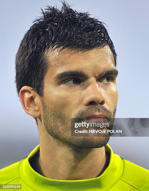 Slovenia�s national football team goalkeeper Aleksander Radosavljevic listens to the national anthem before a friendly match against New Zealand in...