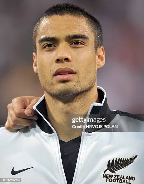 New Zealand's national football team player Winston Reid listens to the national anthem before a friendly match against Slovenia in Maribor, some 150...