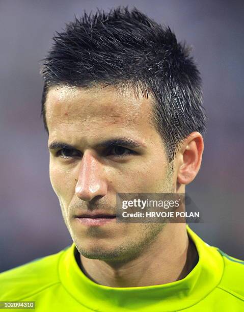 Slovenia�s national football team striker Zlatan Ljubijankic listens to the national anthem before a friendly match against New Zealand in Maribor,...