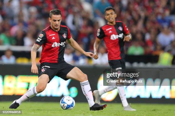 Raúl Rivero of Atlas drives the ball during the fifth round match between Atlas and Morelia as part of the Torneo Apertura 2018 Liga MX at Jalisco...