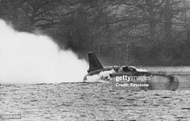 Donald Campbell in his 'Bluebird' at Coniston Water in Lancashire, 24th November 1966. He is preparing for his attempt to raise the water speed...