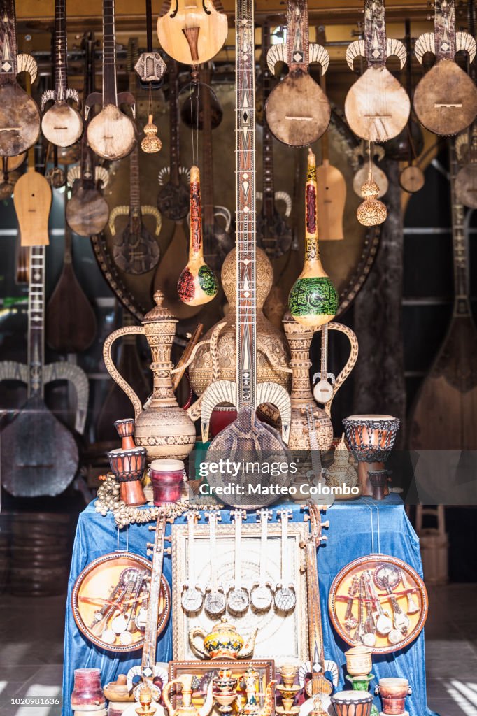 Old guitars in a local antiques shop of Kashgar bazaar, China