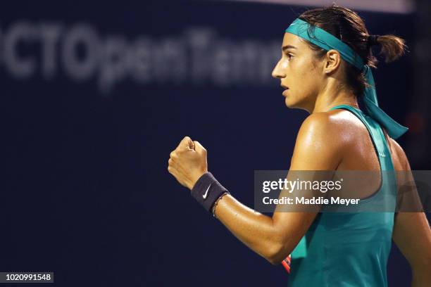 Caroline Garcia of France reacts during her match against Aliaksandra Sasnovich of Belarus during Day 2 of the Connecticut Open at Connecticut Tennis...