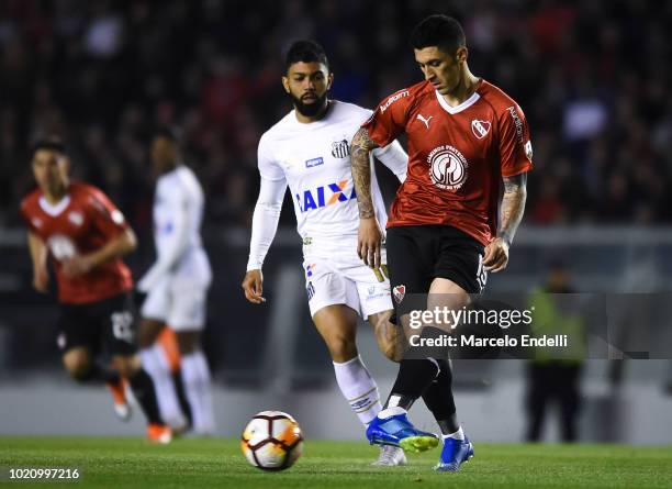 Pablo Hernandez of Independiente kicks the ball during a round of sixteen match between Independiente and Santos as part of Copa CONMEBOL...