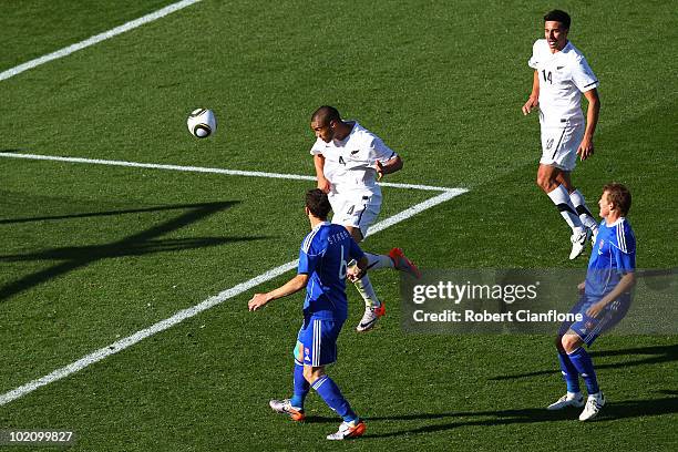 Winston Reid of New Zealand scores the first goal for his team during the 2010 FIFA World Cup South Africa Group F match between New Zealand and...