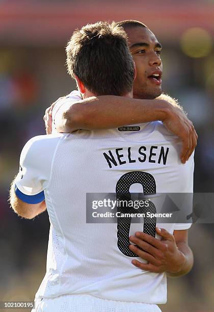 Goalscorer Winston Reid of New Zealand celebrates with Ryan Nelsen at the final whistle during the 2010 FIFA World Cup South Africa Group F match...