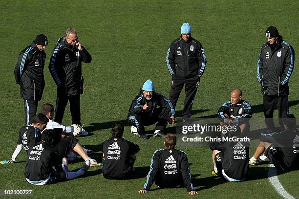 Argentina's head coach Diego Maradona talks with his players during a team training session on June 15, 2010 in Pretoria, South Africa.