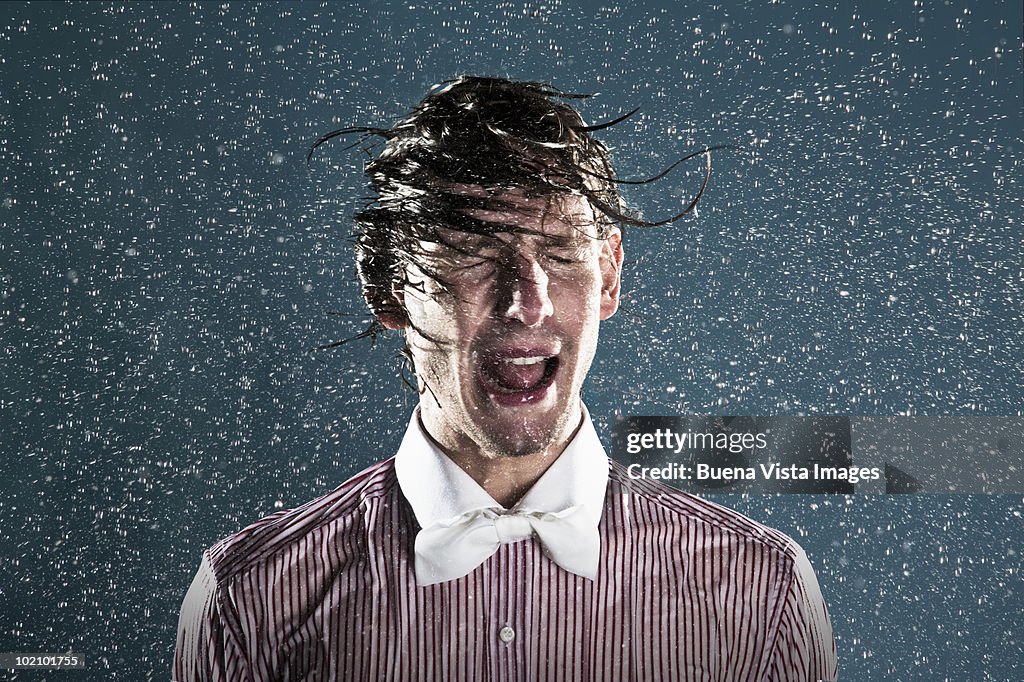 Young man in rain