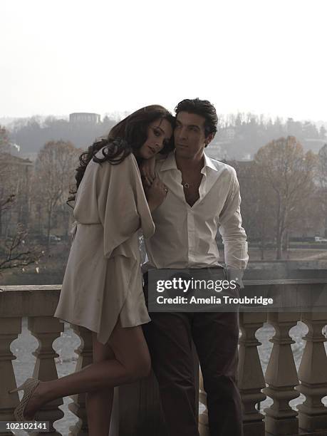 Footballer Gianluigi Buffon & partner the model Alena Seredova pose for a portrait shoot in Turin on December 15, 2009.