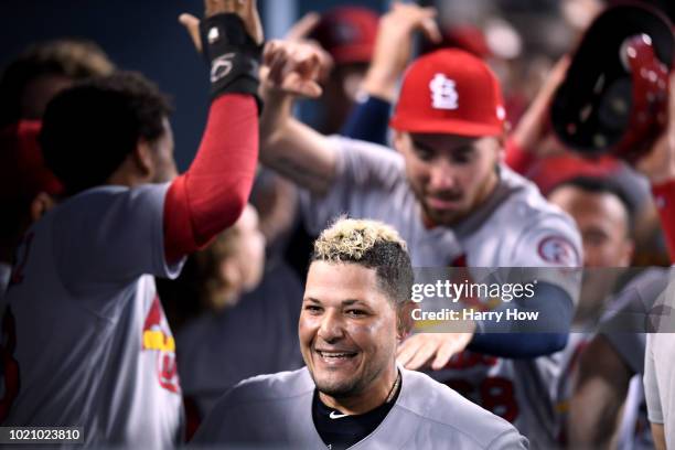 Yadier Molina of the St. Louis Cardinals celebrates his two run homerun to score Jose Martinez to take a 3-1 lead over the Los Angeles Dodgers during...