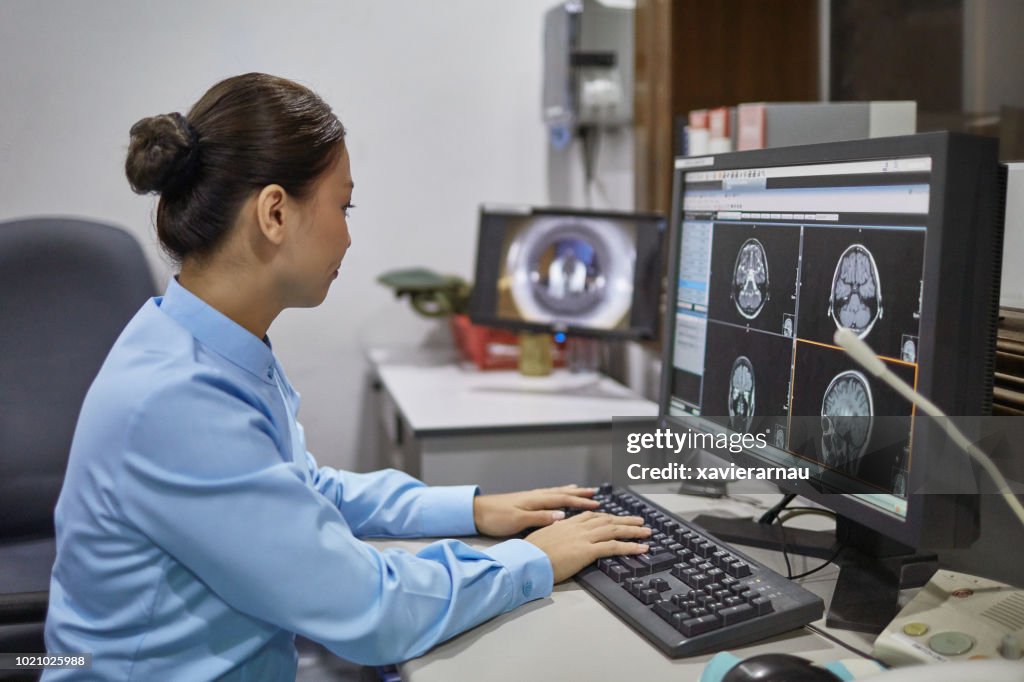 Real Radiologists Computer Radiologist Analyzing Xray Image On Computer High-Res Stock Photo ...