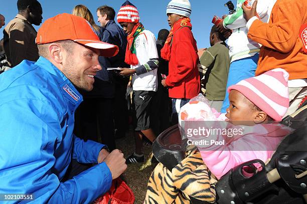 Englands Matthew Upson visits Children from the SOS Children's Village project on June 15, 2010 in Tlhabane Township near Rustenburg, South Africa.
