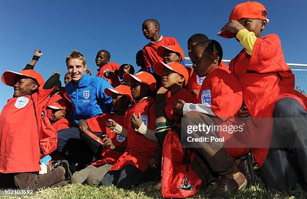 Englands Michael Dawson visits Children from the SOS Children's Village project on June 15, 2010 in Tlhabane Township near Rustenburg, South Africa.