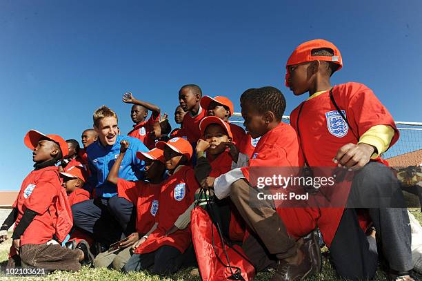 Englands Michael Dawson visits Children from the SOS Children's Village project on June 15, 2010 in Tlhabane Township near Rustenburg, South Africa.