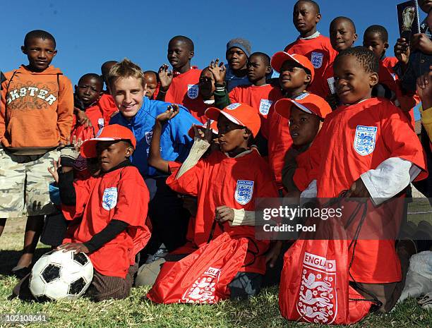 Englands Michael Dawson visits Children from the SOS Children's Village project on June 15, 2010 in Tlhabane Township near Rustenburg, South Africa.