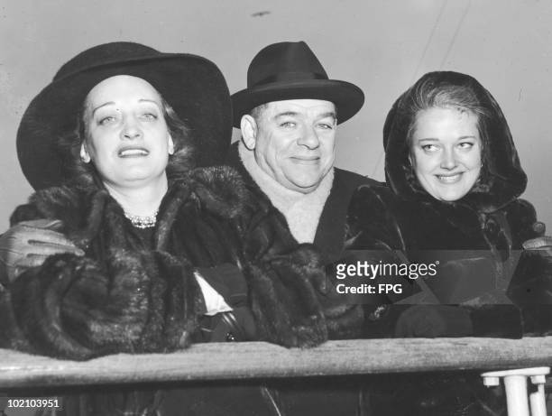 American theatrical producer Oscar Hammerstein II arrives in New York on the liner 'Mauretania' with his wife Dorothy and her daughter Susan...