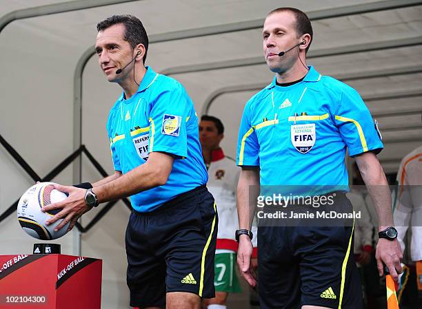 Referee Jorge Larrionda picks up the official jabulani match ball prior to the 2010 FIFA World Cup South Africa Group F match between New Zealand and...