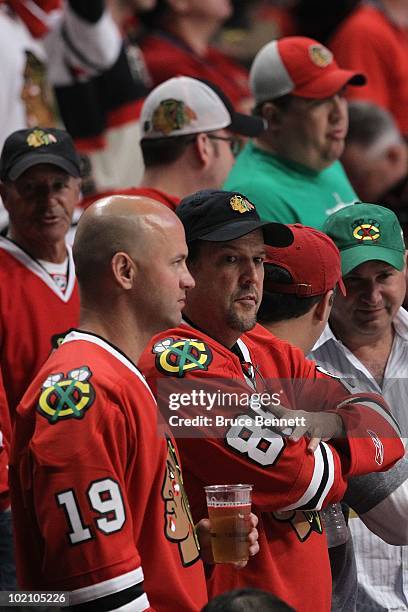 Fans of the Chicago Blackhawks watch Game Five of the 2010 NHL Stanley Cup Final against the Philadelphia Flyers at the United Center on June 6, 2010...