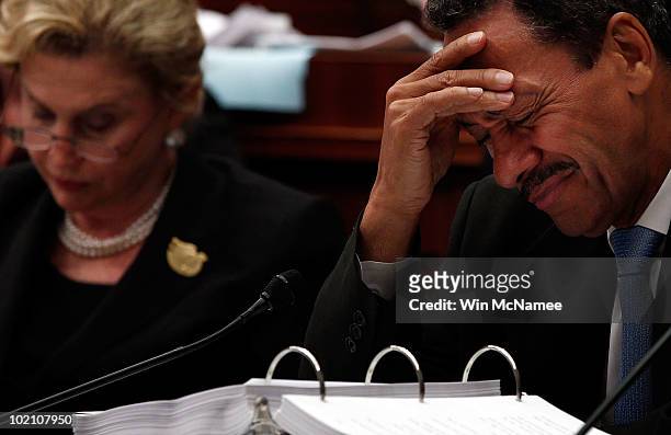Rep. Mel Watt looks over financial reform legislation during the House-Senate Conference Committee meeting on H.R.4173, the "Wall Street Reform and...