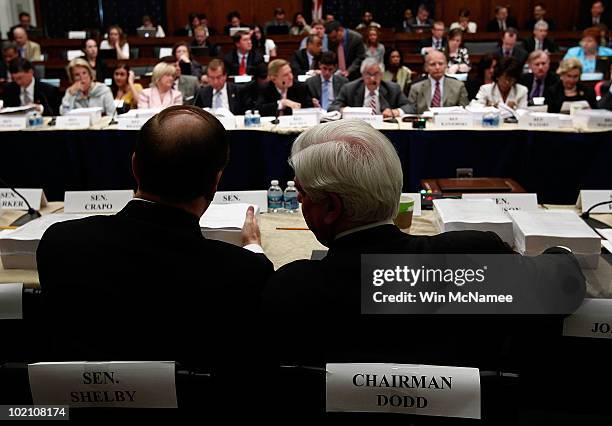 Senate Banking Committee Chairman Sen. Chris Dodd speaks with ranking member Sen. Richard Shelby during the House-Senate Conference Committee meeting...