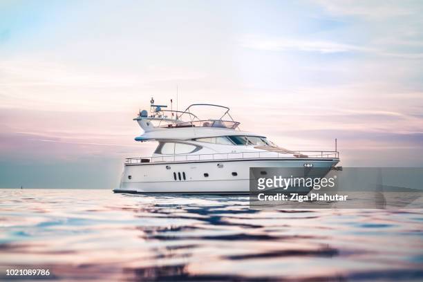 beautiful colours and beautiful yacht - luxury yacht stock pictures, royalty-free photos & images