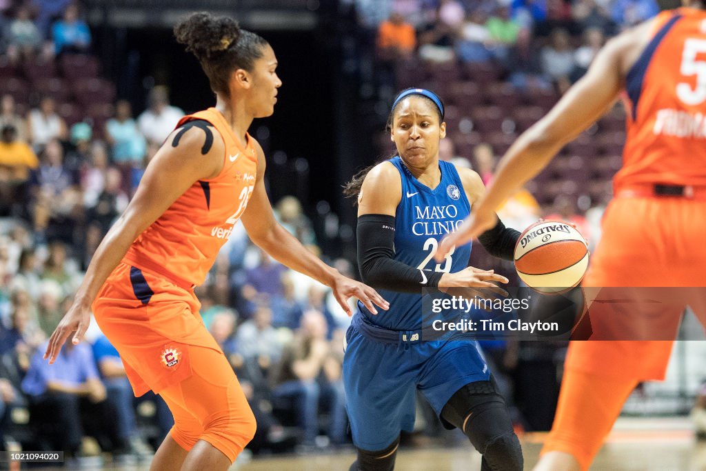 Maya Moore of the Minnesota Lynx defended by Alyssa Thomas of the ...