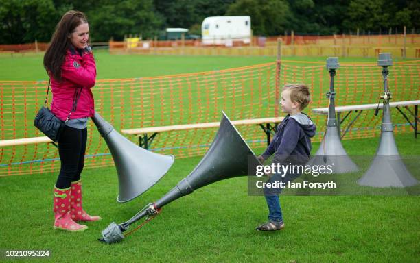 Maximus Burgess from Ripon helps his mother move loudspeakers during setting up at Rosedale Show on August 18, 2018 in Kirkbymoorside, England....