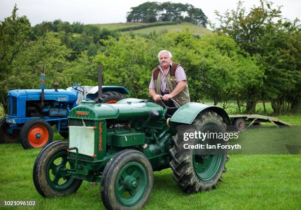 Man drives his vintage Fordson tractor during Rosedale Show on August 18, 2018 in Kirkbymoorside, England. Founded in 1871, this annual show is held...