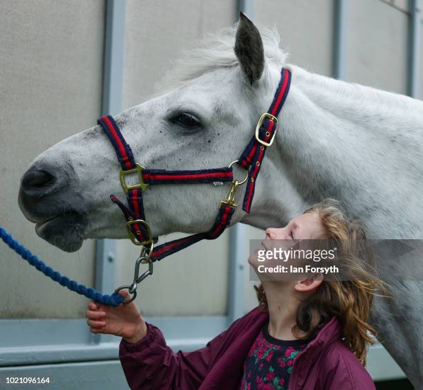 Georgie Gospel stands with her horse during Rosedale Show on August 18, 2018 in Kirkbymoorside, England. Founded in 1871, this annual show is held in...