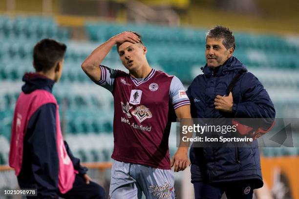 Leichhardt Tigers midfielder Corey Bizco is emotional as his substituted due to injury at the FFA Cup Round 16 soccer match between APIA Leichhardt...