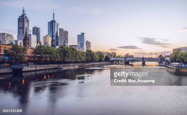 the cityscape of melbourne at dawn. victoria state of australia. - river yarra stock pictures, royalty-free photos & images