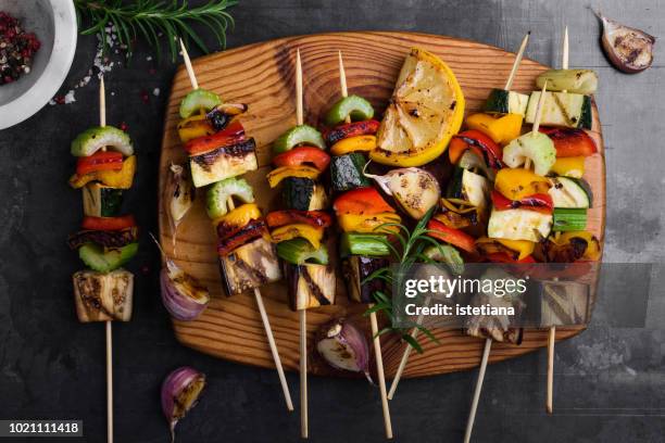 colorful grilled summer seasonal vegetables skewers - fruits table top stock-fotos und bilder