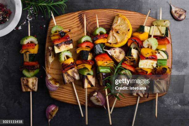 colorful grilled summer seasonal vegetables skewers - vegetarian meal stock pictures, royalty-free photos & images