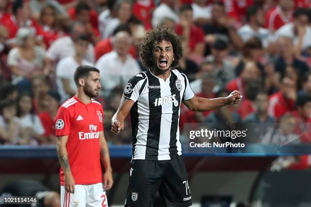 S midfielder Amr Warda from Egypt celebrates after scoring a goal during the UEFA Champions League play-off first leg match SL Benfica vs PAOK FC at...